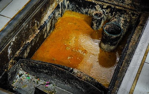 regular grease trap cleaning can prevent costly plumbing concerns and reduce the risk of fines, saving you money in the long run